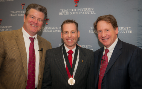 Eric MacLaughlin, Pharm.D. (center), with TTUHSC President Tedd L. Mitchell, M.D., and Chancellor Robert L. Duncan