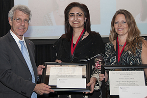 Naghma Farooqi, M.D., and Candy Arentz, M.D., were recognized for establishing a woman's free clinic.