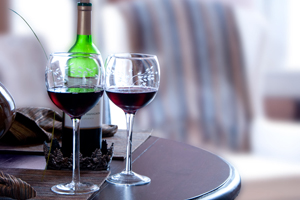 Show your romantic side and save calories by choosing a glass of red wine over a mixed drink.