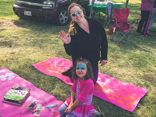 Pediatrics Employees Volunteer at Yoga Festival