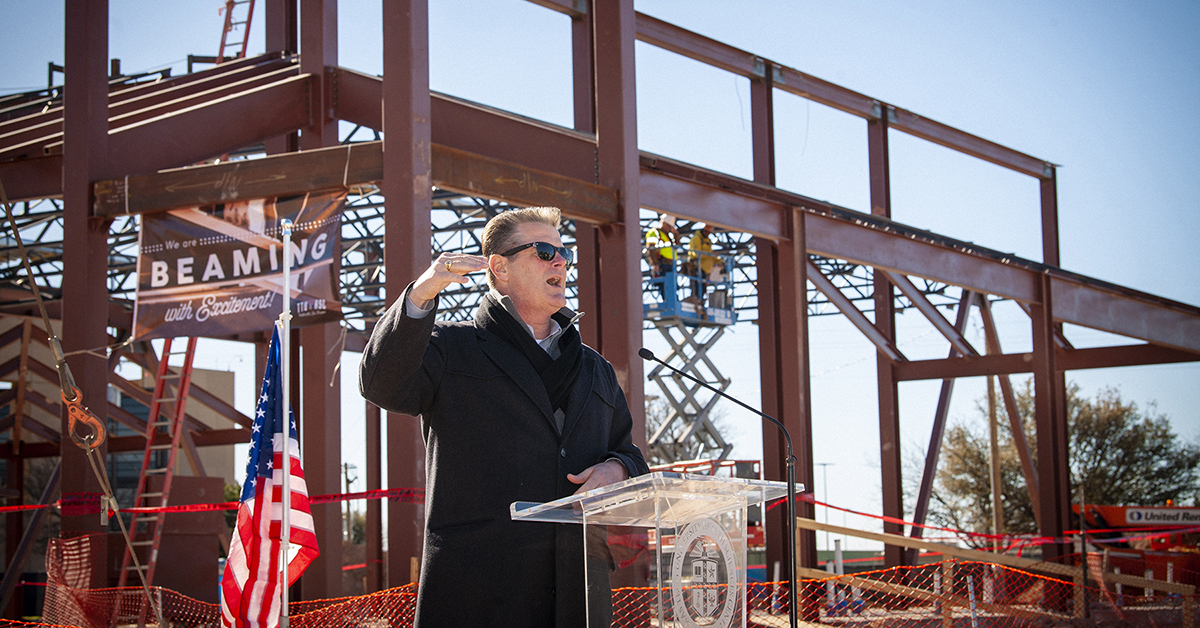 President Mitchell speaks at beam topping ceremony