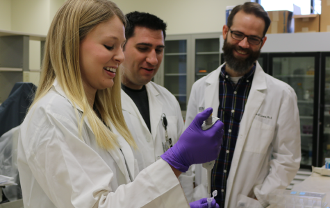 Lowe with students in the lab.