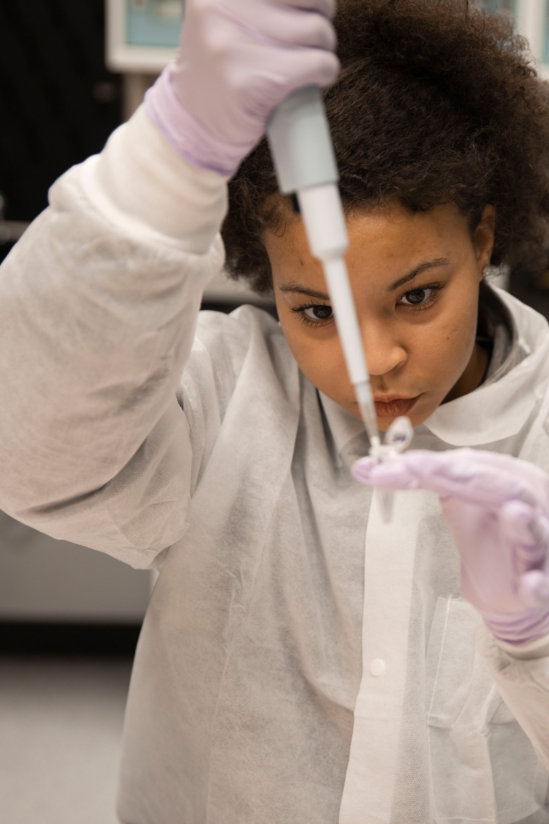 Up close image of TTUHSC student in lab working in the field of molecular pathology.