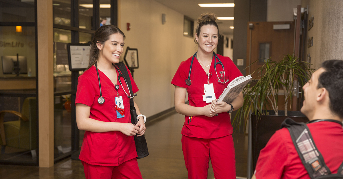 Nursing students in hallway