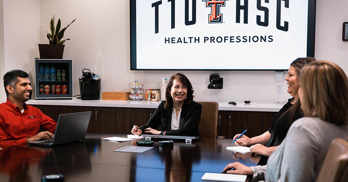 health professions group sitting at a conference table