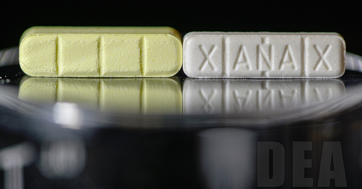close-up of xanax pill next to a counterfeit pill