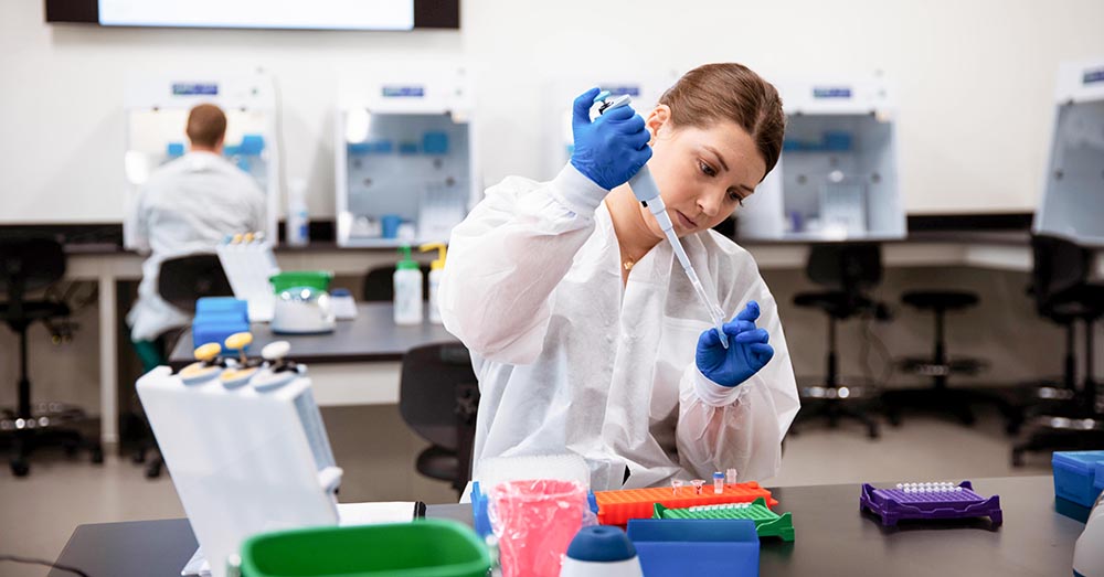 woman working in molecular pathology