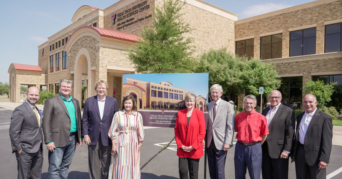 TTUHSC prsident and donors in front of Abilene campus.