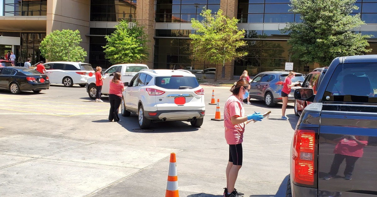 cars using a drive through system to dispose of old medication safely