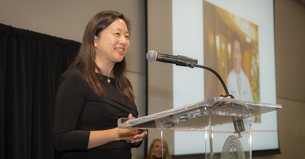 Elise Cheng accepting the TTUHSC Presidential Award for Heroism