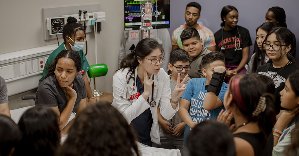 SNMA students with fifth graders for Doctors for a Day