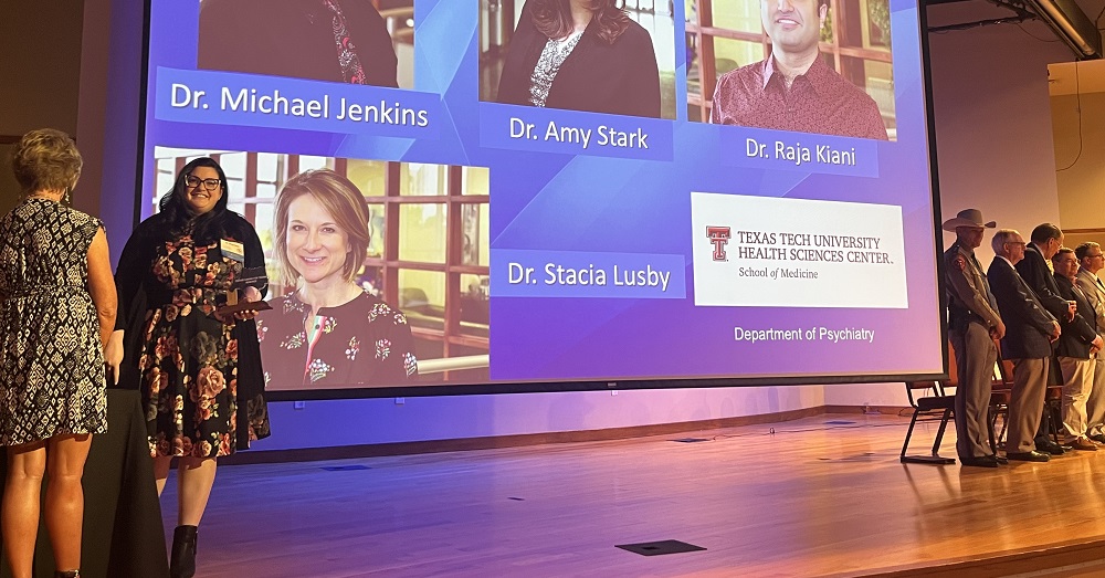 People standing on stage at the Texans Caring for Texans Awards 2023