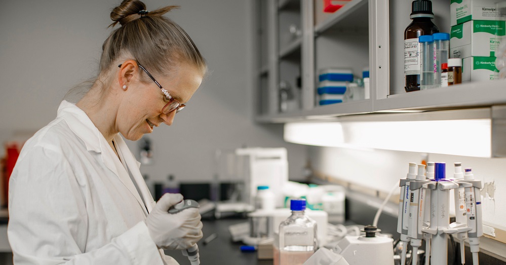 Dr. Guindon working in a lab setting