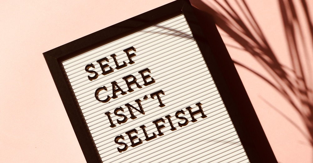 graphic that reads "self care isn't selfish"