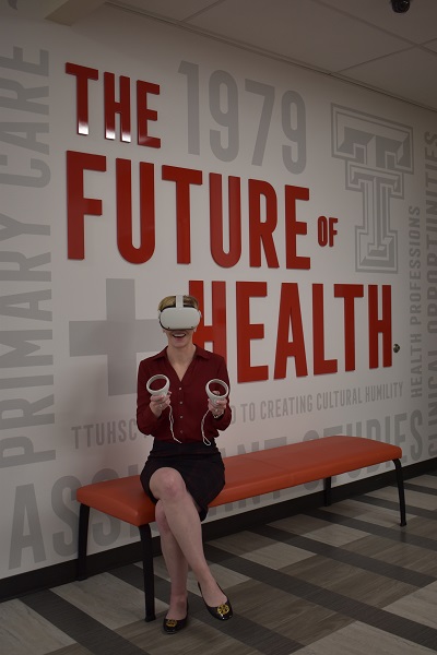 woman wearing virtual reality headset sitting on a bench