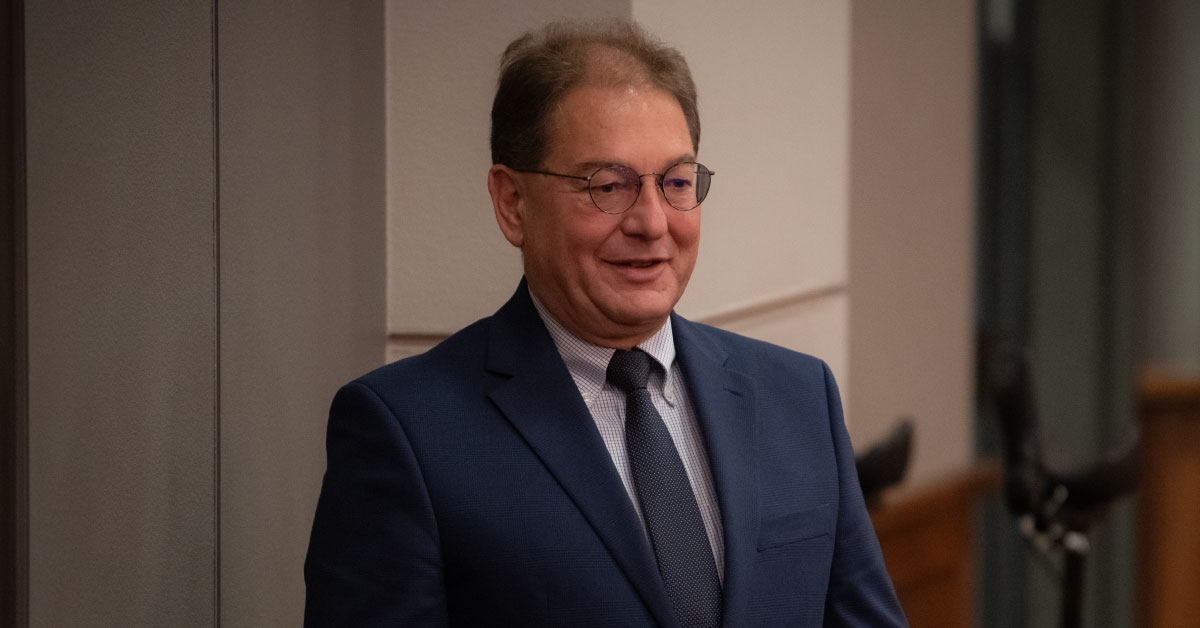 Male TTUHSC professor wears a suit and tie.