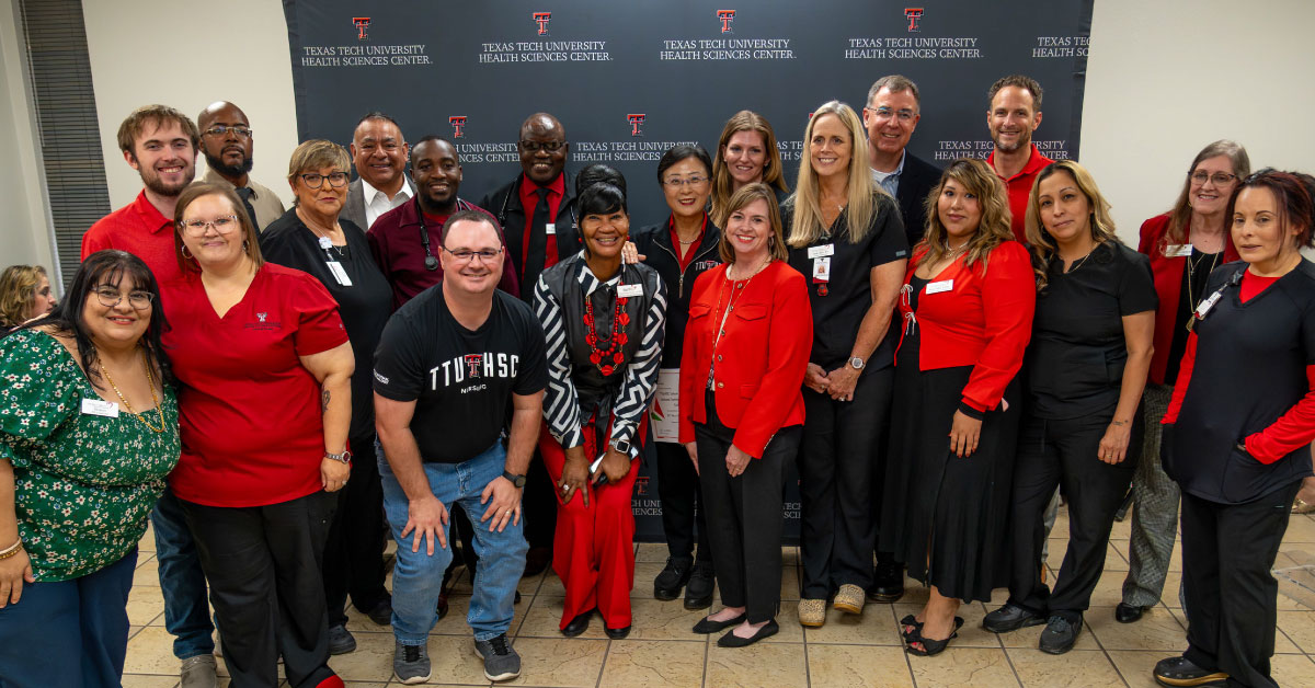 Clinic staff pose for a group photo.