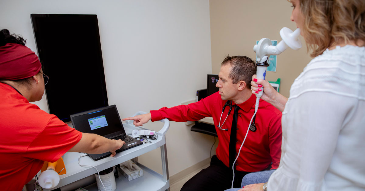 Doctor and nurse treat patient with Bronchoscopic Lung Volume Reduction (BLVR) device.