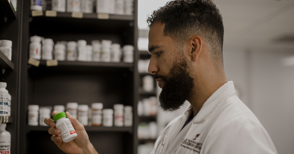TTUHSC pharmacy professional looking at medication