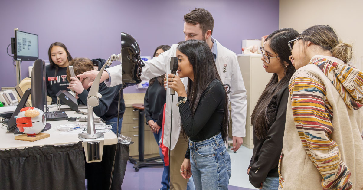TTUHSC medical students work with high school students.