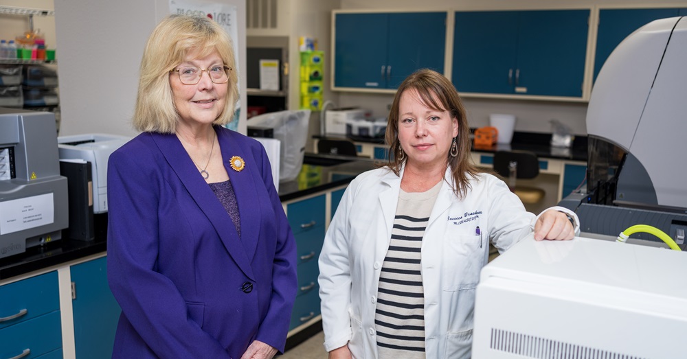 two women in a lab setting