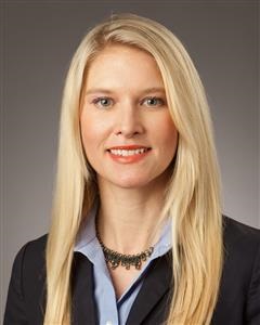 woman smiles for headshot