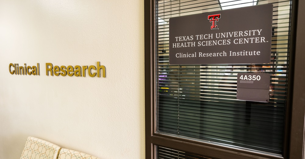 office door with the words "clinical research" on the wall