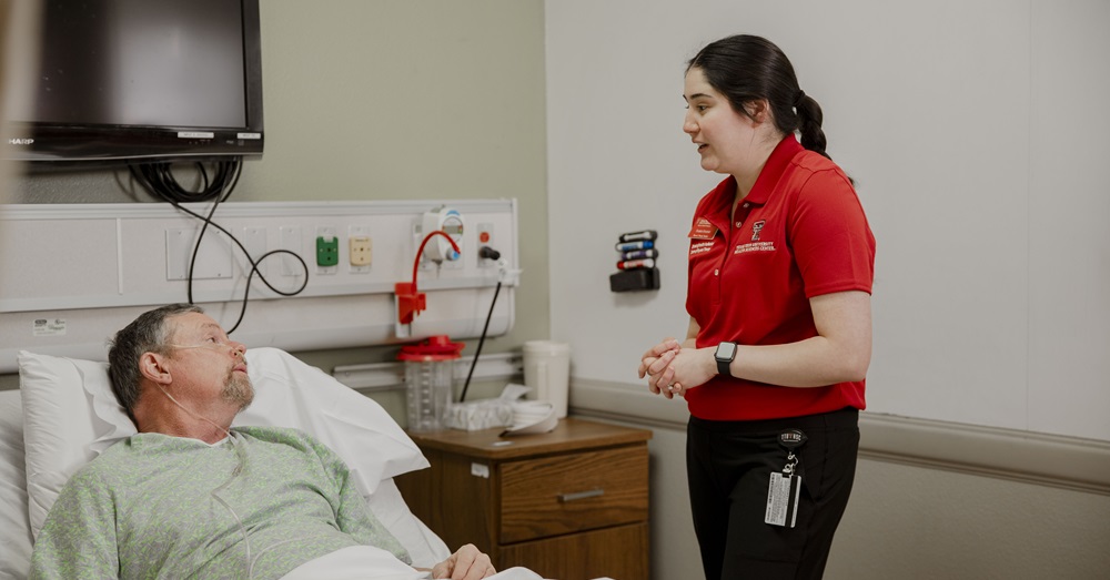 health care professional talking to patient