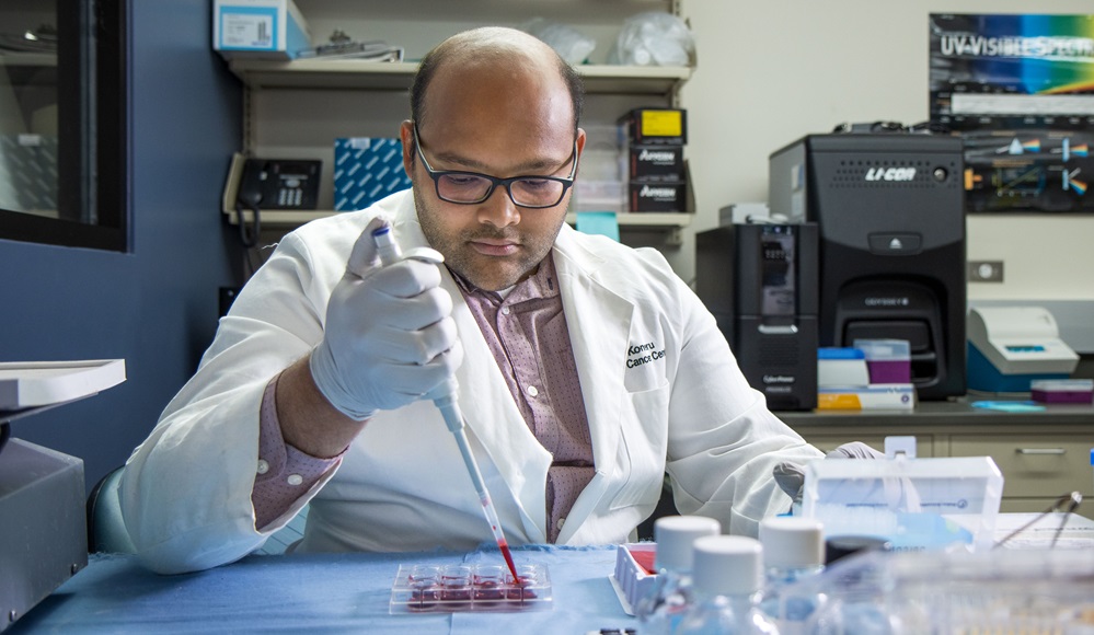 Balakrishna Koneru, Ph.D. working in a lab