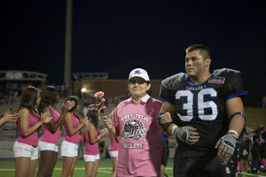 During halftime, survivors like John Mireles' grandmother (pictured above) were recognized for their perseverance in their fight against breast cancer.