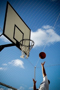 Group activities, like playing basketball, are a good way to burn calories and spend time with friends or family.