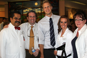 Paul L. Foster School of Medicine administrators and students celebrate after the White Coat Ceremony in El Paso.