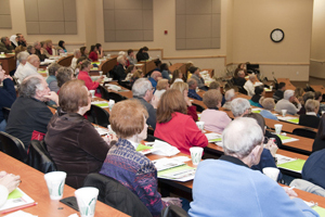 Community Medical School students learn about various health topics in an informal setting.