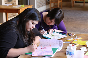 First-year medical students write messages of encouragement to children with cancer.