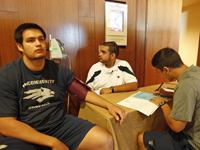 Reyes (center) is a second-year Masters of Athletic Training Student in the School of Allied Health Sciences.