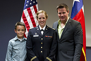 Roberts' husband and son pinned her uniform with her new rank at the ceremony.
