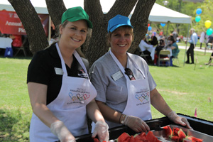 Employees volunteered to serve lunch at the annual picnic.