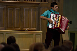 First-place winner Faraz Harsini played the piano, bagpipes and accordion.
